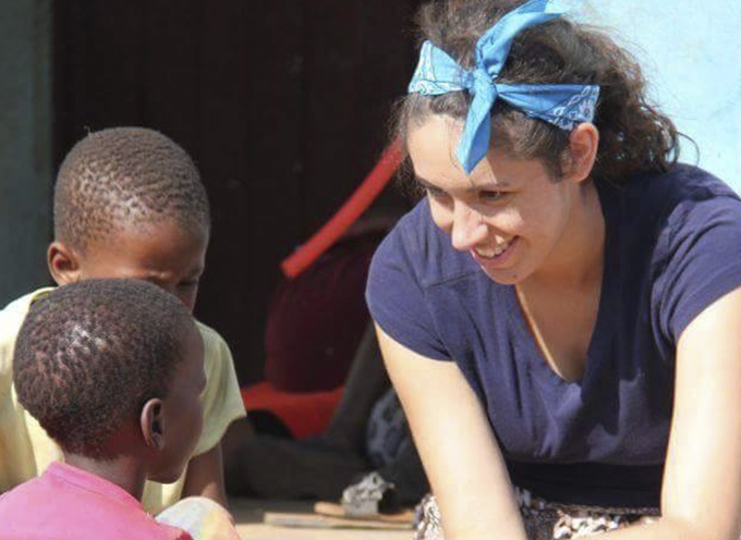 Single dancer featured section Alexandra Warwick with children in Eswantini